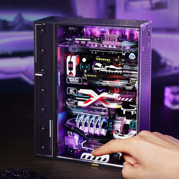 ROKR Future City marble run finished cabinet glows purple with a hand nearby.