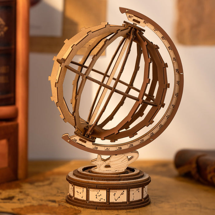 Dark amber wooden globe with open lattice frame and geographic engravings on a cylindrical base in a warm bookshelf setting