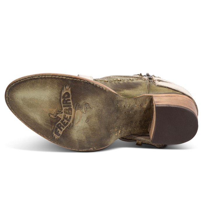 Leather sole imprinted with FREEBIRD on women's Samantha green low heeled bootie