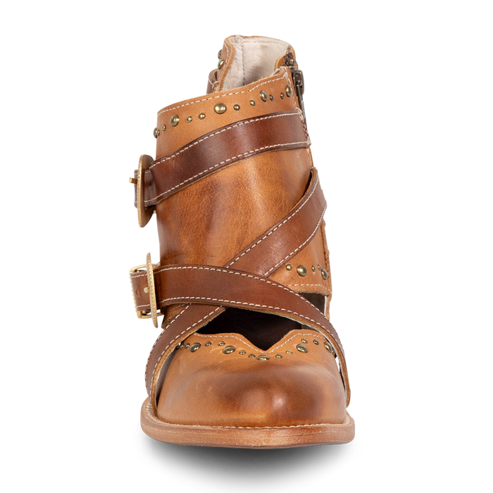 Front view showing contrasting leather straps and stud detailing on FREEBIRD women's Samantha honey low heeled bootie