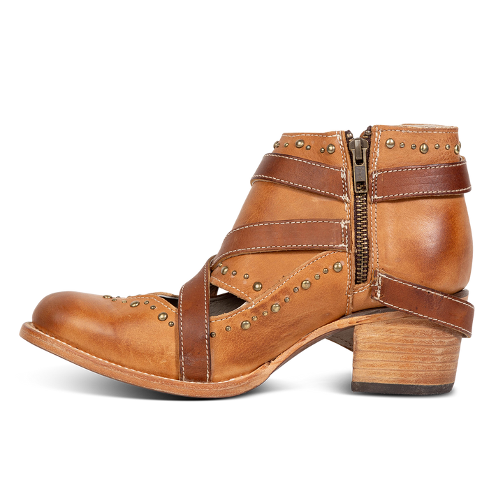 Side view showing low heel and working brass zip closure on FREEBIRD women's Samantha honey bootie
