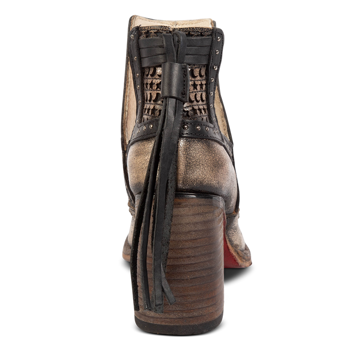 Back view showing wrapped heel and leather heel tassel detailing on FREEBIRD women's Sharona pewter bootie