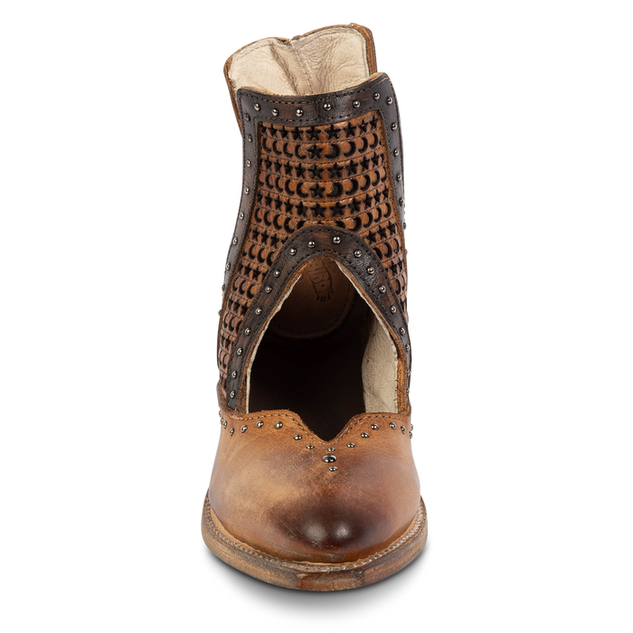 Front view showing instep cutout, silver stud detailing, and star/moon laser cut leather on FREEBIRD women's Sharona tan bootie