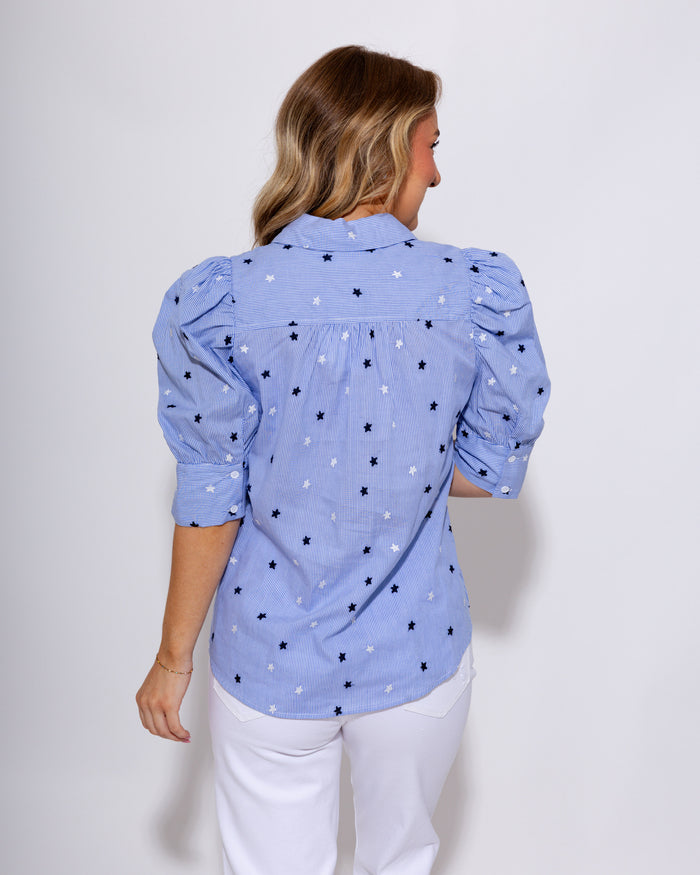 Blue striped puff sleeve button-up blouse with star embroidery and ruffle cuffs, women's boutique top at Gaudie & Co