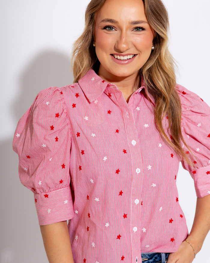 Red striped puff sleeve button-up blouse with star embroidery and ruffle cuffs, women's boutique top at Gaudie & Co
