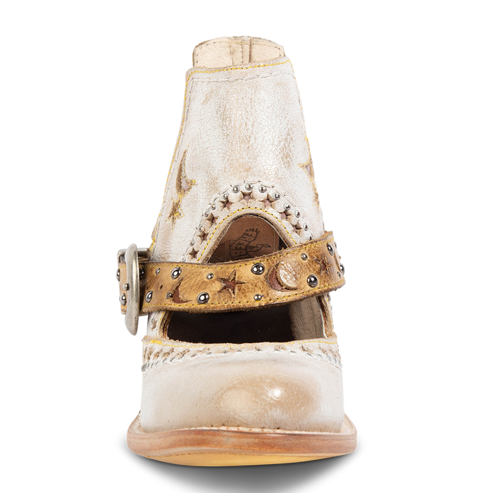 Front view showing laser cut leather detailing, instep cutout, and ankle strap with stars/moons on FREEBIRD women's Stardom beige bootie