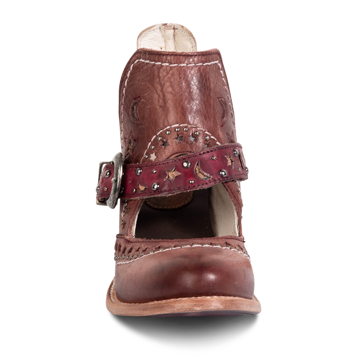Front view showing laser cut leather detailing, instep cutout, and ankle strap with stars/moons on FREEBIRD women's Stardom wine bootie
