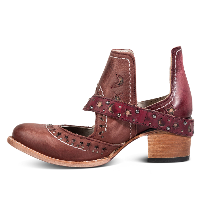 Side view showing a decorative ankle strap, silver stud detailing, and exposed ankles on FREEBIRD women's Stardom wine bootie