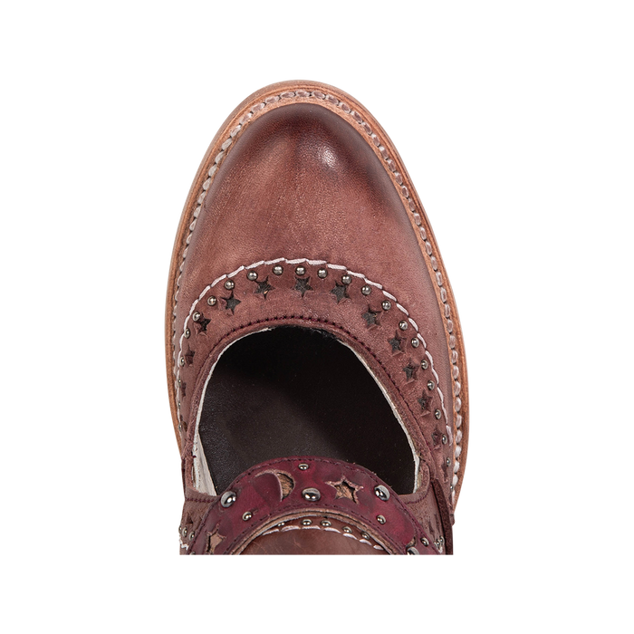 Top view showing an almond toe construction and decorative detailing on FREEBIRD women's Stardom wine bootie