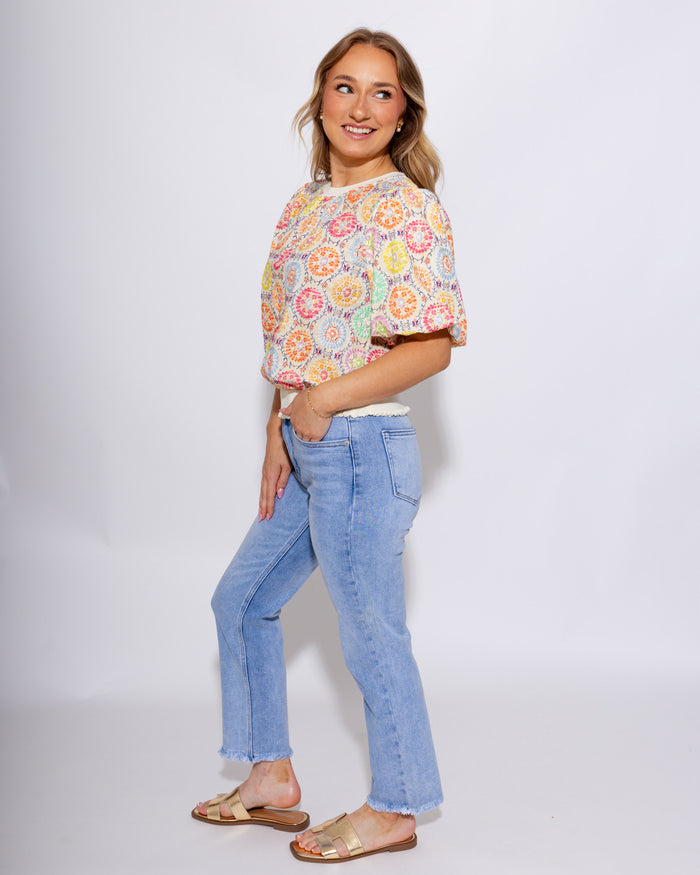 Mid-rise straight leg light wash denim jeans with fray hem detail, women's boutique denim at Gaudie & Co