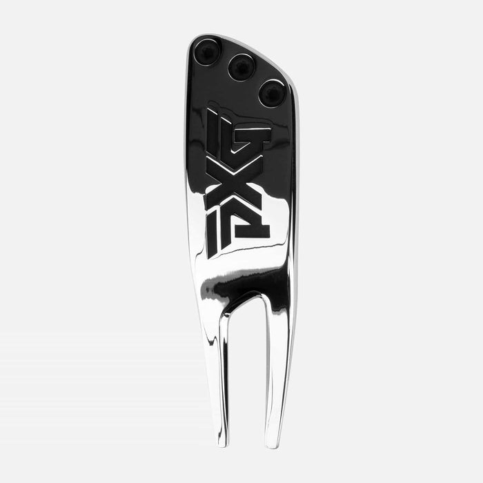 PXG chrome golf divot tool that is weighted and has a PXG logo on the handle and is on a white background
