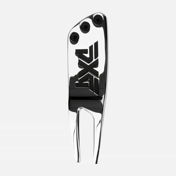 PXG chrome golf divot tool that is weighted and has a PXG logo on the handle and is on a white background