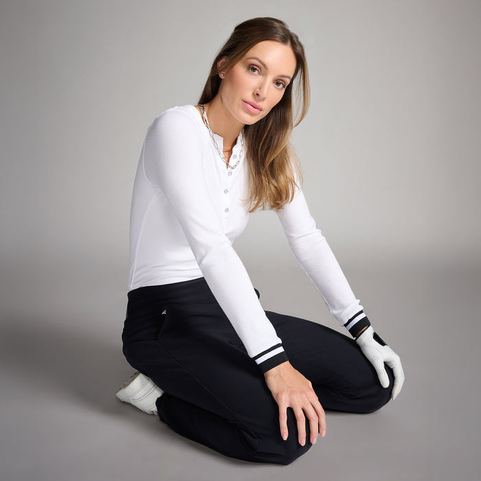 Women's Go-To Golf Pant in Black, side seated view