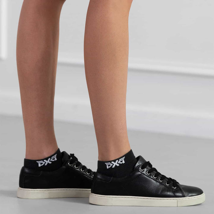 PXG women's black jacquard logo ankle socks with a white PXG logo on a white background