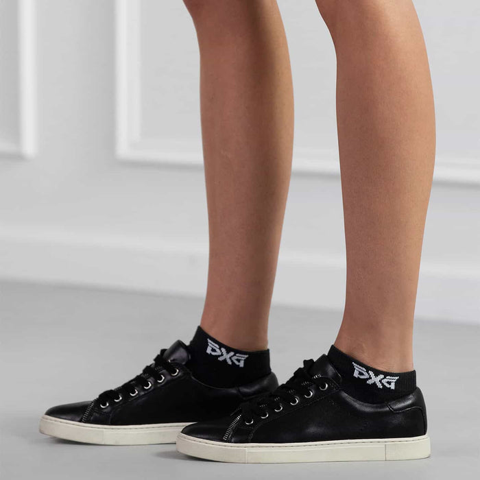 PXG women's black jacquard logo ankle socks with a white PXG logo on a white background