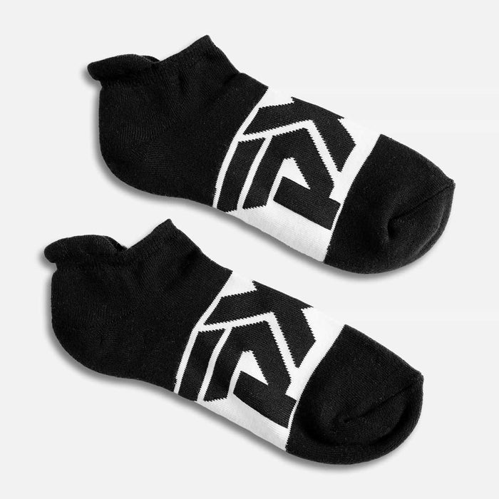 PXG women's black logo low cut socks with a white PXG logo on a white background