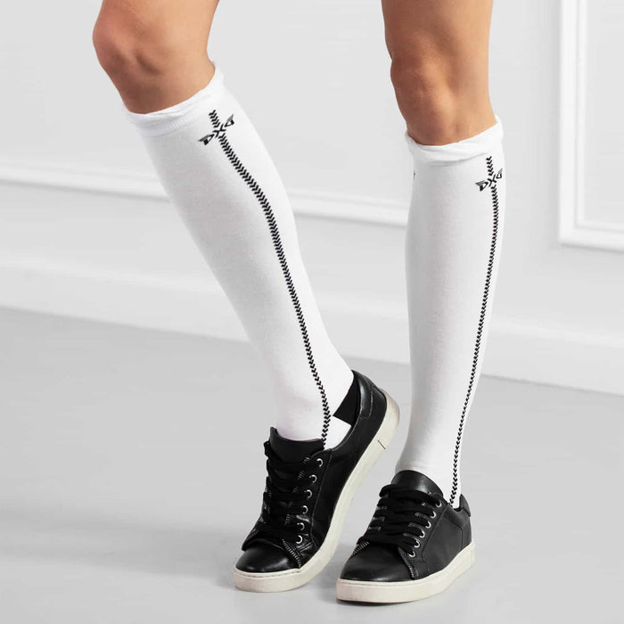 PXG women's white ruffle knee golf socks with ruffles at the top and a black PXG logo on a white background